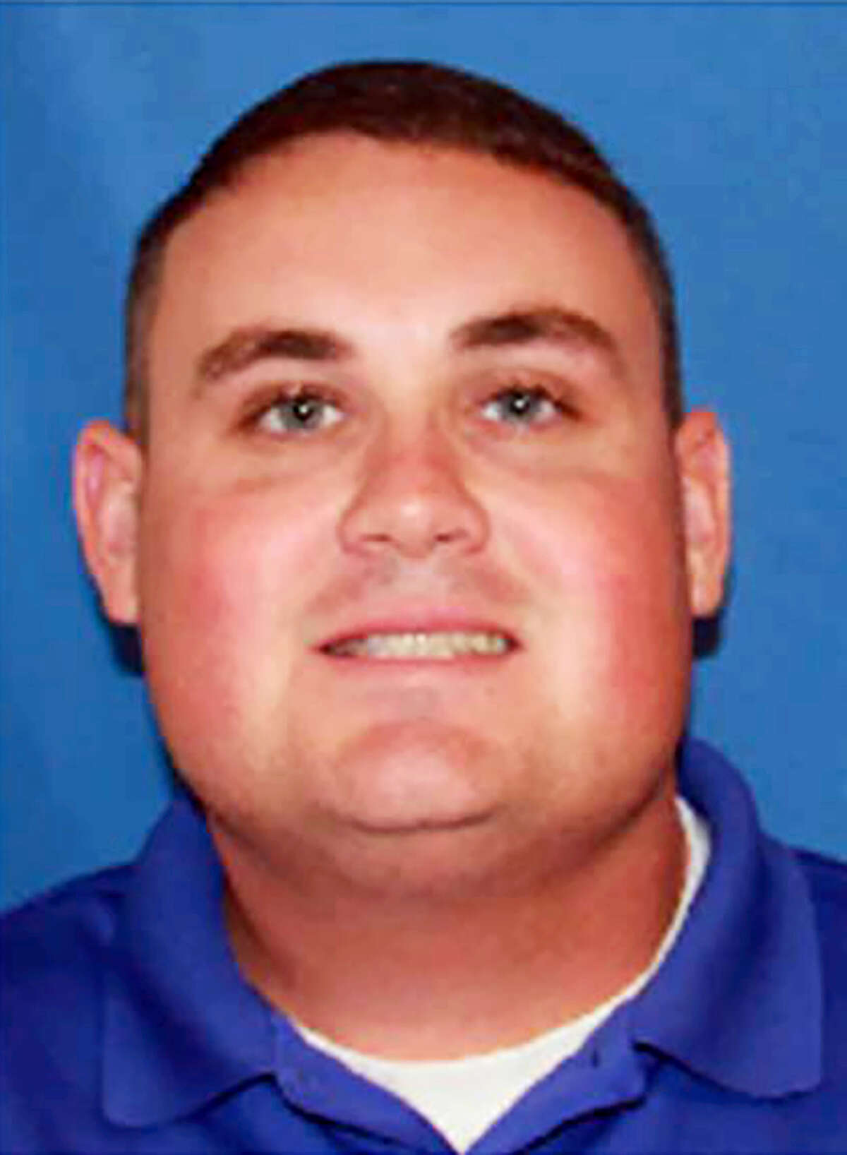 This undated image provided by Georgia Southwestern State University shows campus police officer Jody Smith. The manhunt for 32-year-old Minquell Lembrick ended a Thursday, Dec. 8, 2016, they day after the alleged gunman killed Americus police Officer Nicholas Smarr and Officer Jody Smith of Georgia Southwestern State University. Both officers were shot as they responded to a domestic disturbance call in Americus, a rural city 130 miles south of Atlanta.