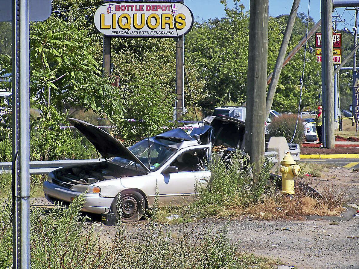 Part of Frontage Road in East Haven was shut down Wednesday after a silver car crashed into a utility pole, killing one of the passengers. The accident near Home Depot completely closed a half-mile stretch of road for hours.