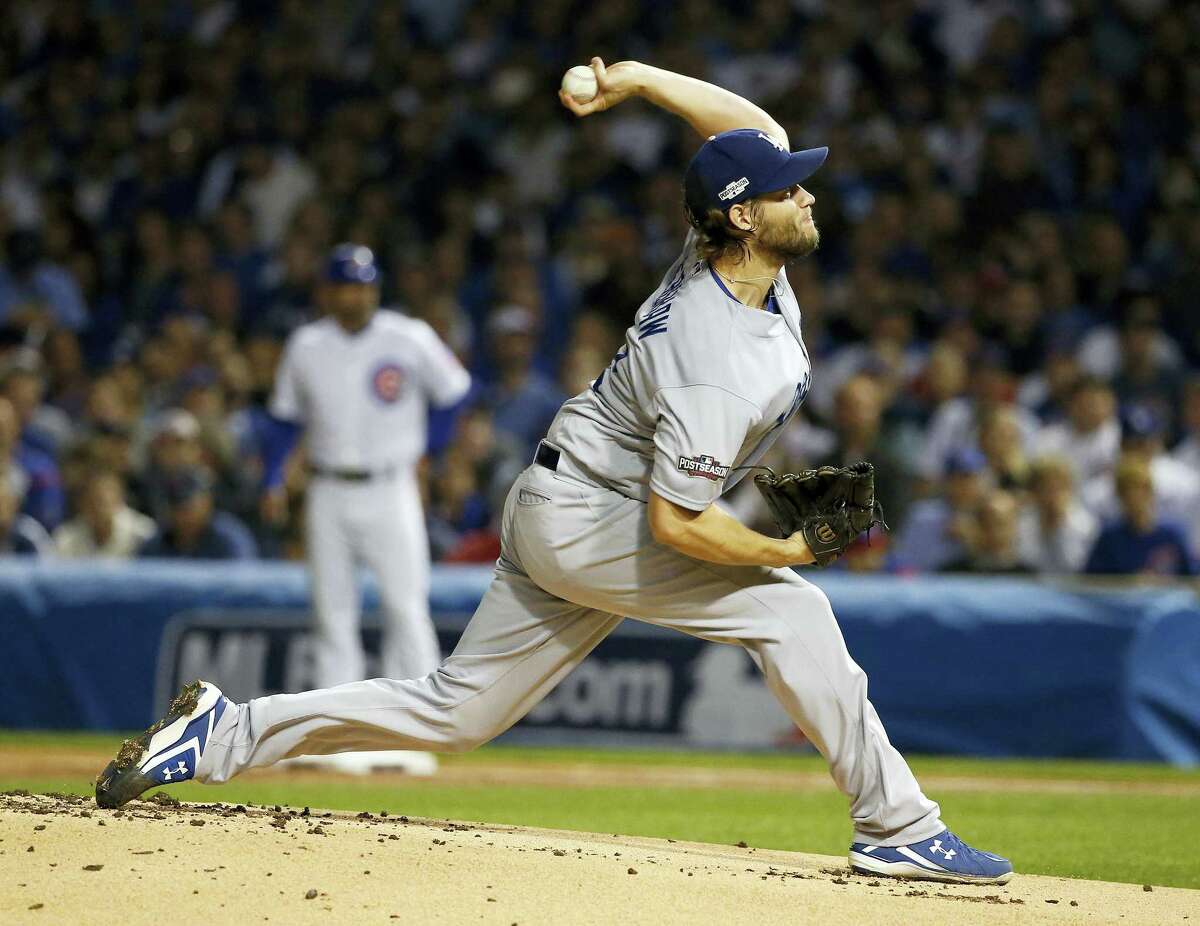 Dodgers starting pitcher Clayton Kershaw throws during Game 2 of the NLCS on Sunday in Chicago.