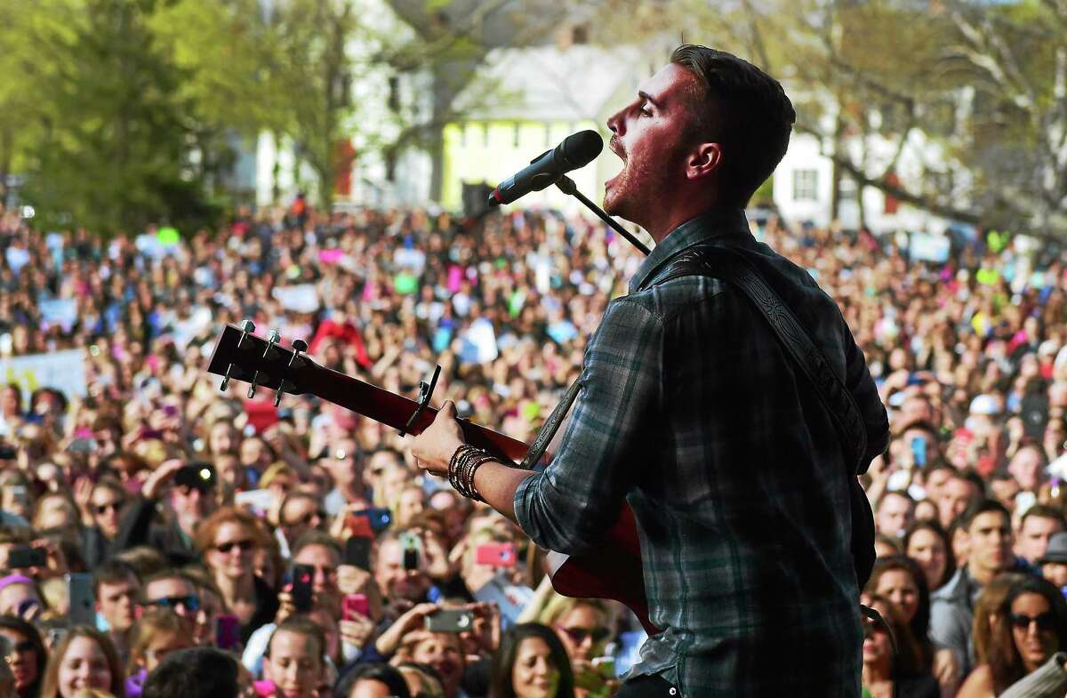 (Peter Hvizdak - New Haven Register) American Idol’s Nick Fradiani of Guilford, performs a concert on the Guilford Green after a welcome home parade on Whitfield Street in Guilford, Connecticut Friday, May 1, 2015.