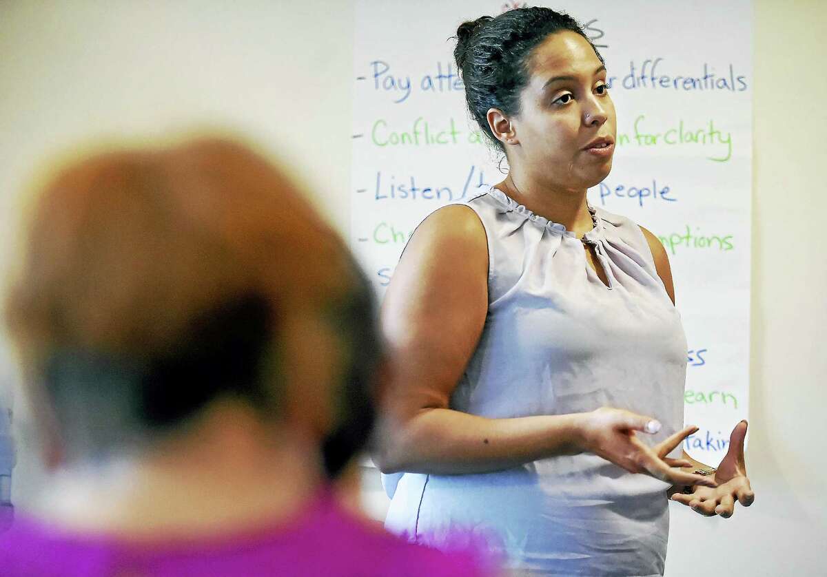 Krystal Ambrozaitis, an anti-human trafficking coordinator at the Salvation Army of Southern New England, speaks Wednesday during a training session held by the Connecticut Coalition to End Homelessness in Hamden.