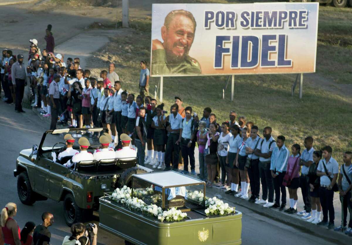 The motorcade carrying the ashes of the late Cuban leader Fidel Castro makes i’s final journey towards the Santa Ifigenia cemetery in Santiago, Cuba Sunday, Dec. 4, 2016.