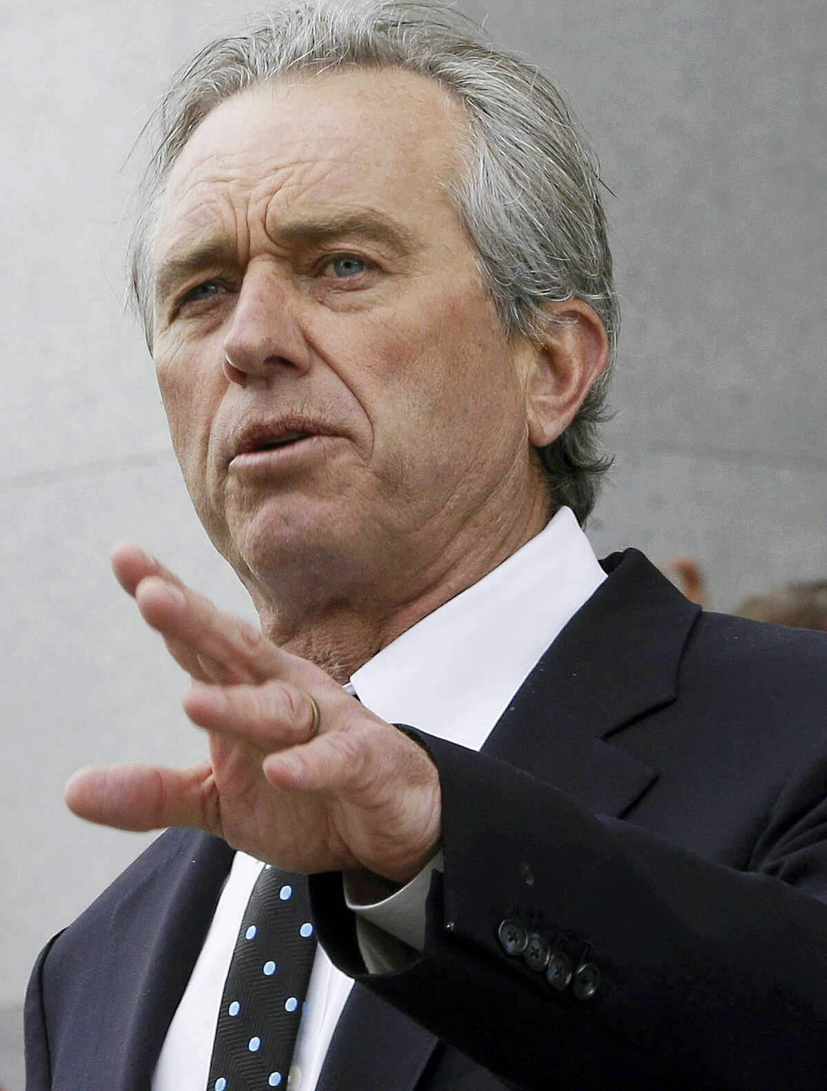 Robert Kennedy Jr., son of former U.S. Attorney Gen. Robert Kennedy, speaks last year during a rally at the Capitol in Sacramento, Calif. In a new book released Tuesday, July 12, 2016, Kennedy argues that his cousin Michael Skakel is innocent of murdering his neighbor Martha Moxley in 1975 when they both were 15. Skakel was convicted in 2002 and sentenced to 20 years to life in prison.