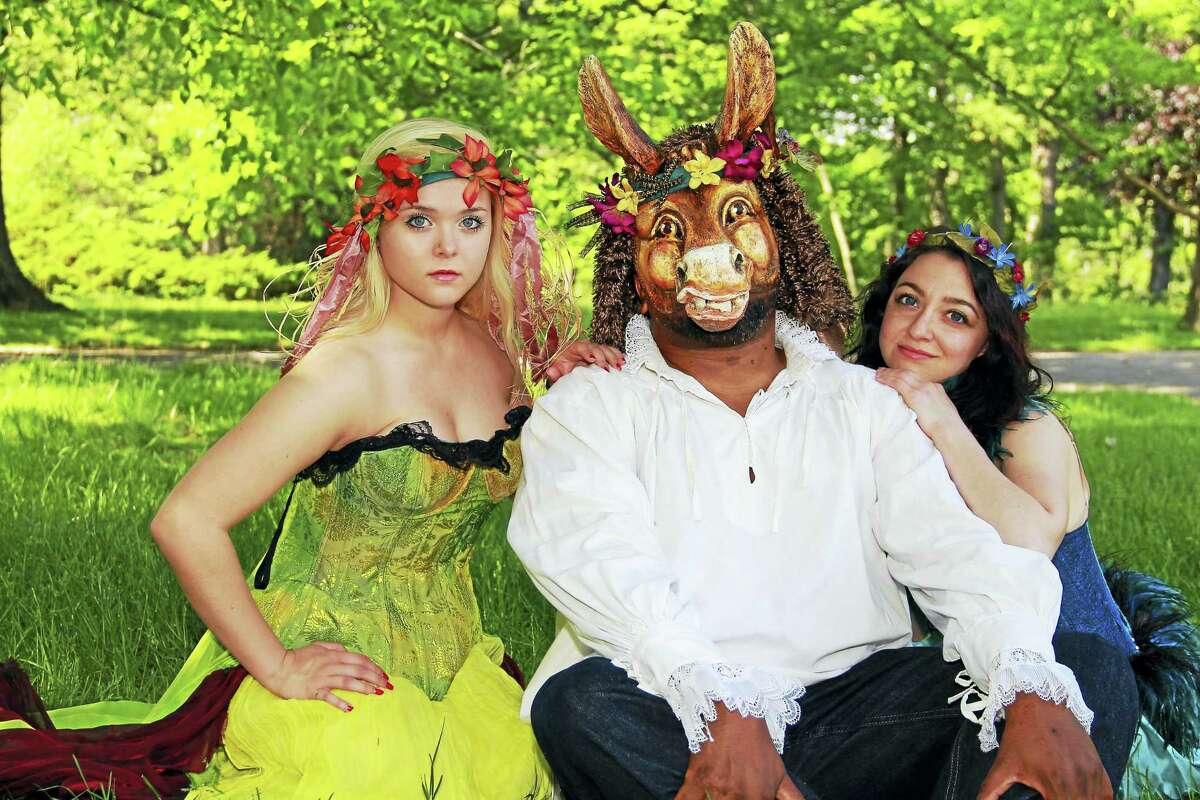 Raphael Massie, in mask, with Brianna Bauch and Elisa Albert at a photo shoot in the park.