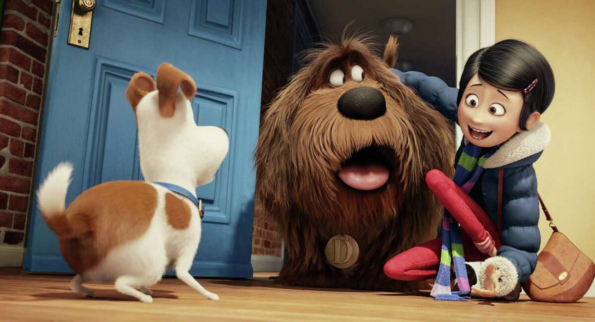 In this image released by Universal Pictures, from left, characters Max, voiced by Louis C.K., Duke, voiced by Eric Stonestreet, and Katie, voiced by Ellie Kemper, appear in a scene from “The Secret Lives of Pets.”