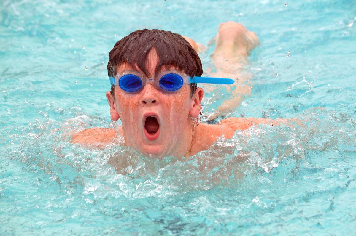 Lucas Marsh of Water Works competes in the boys’ 9-10 200-meter medley relay.