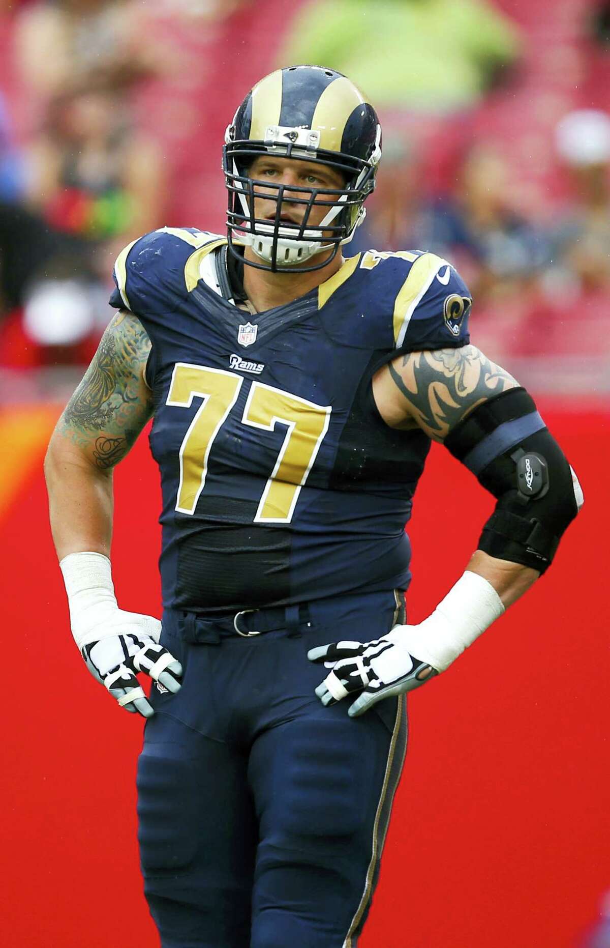 In this Sept. 14, 2014 photo, St. Louis Rams tackle Jake Long (77) lines-up against the Tampa Bay Buccaneers, during an NFL game in Tampa, Fla. The Minnesota Vikings have signed offensive tackle Jake Long, a former first overall draft pick recently beset by injuries.