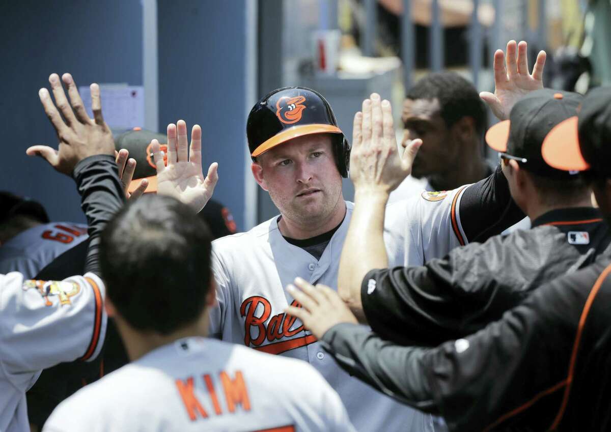 The Orioles’ Mark Trumbo, center, will be part of the Home Run Derby in San Diego on Monday.