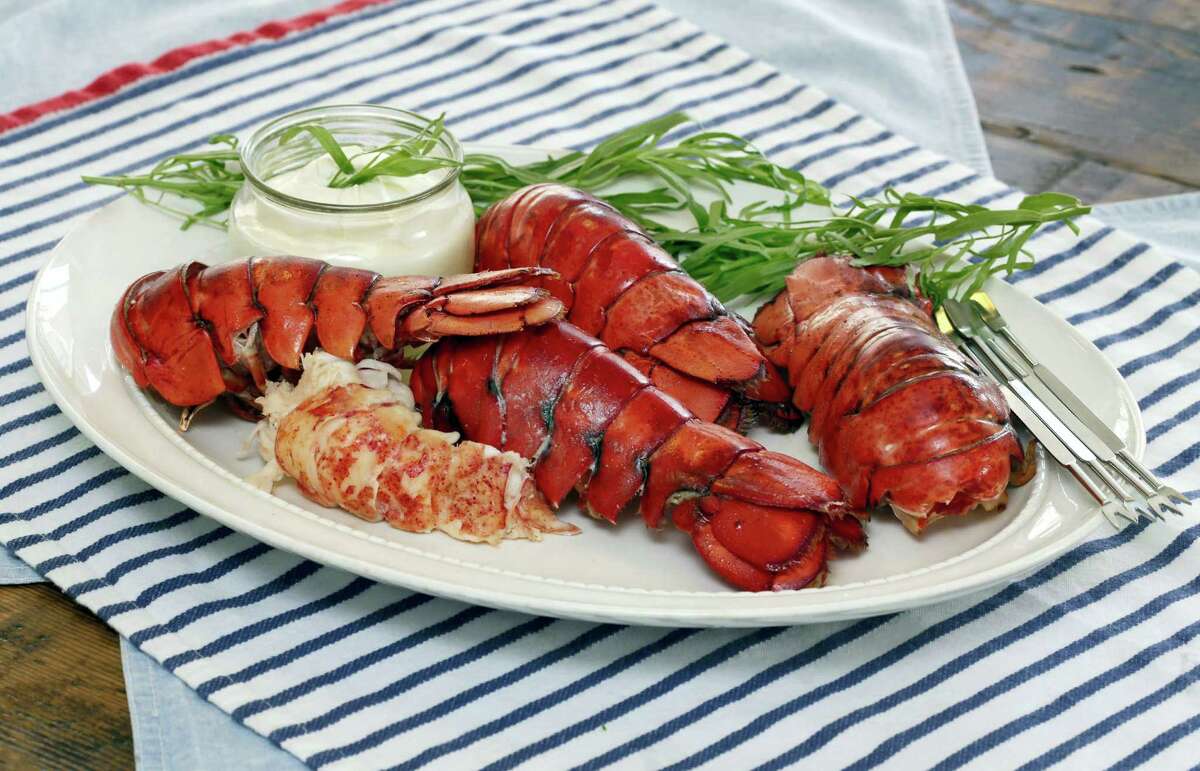 This photo shows a plate of lobster tails styled by Sarah Abrams, at the Institute of Culinary Education in New York. This dish is from a recipe by Elizabeth Karmel.