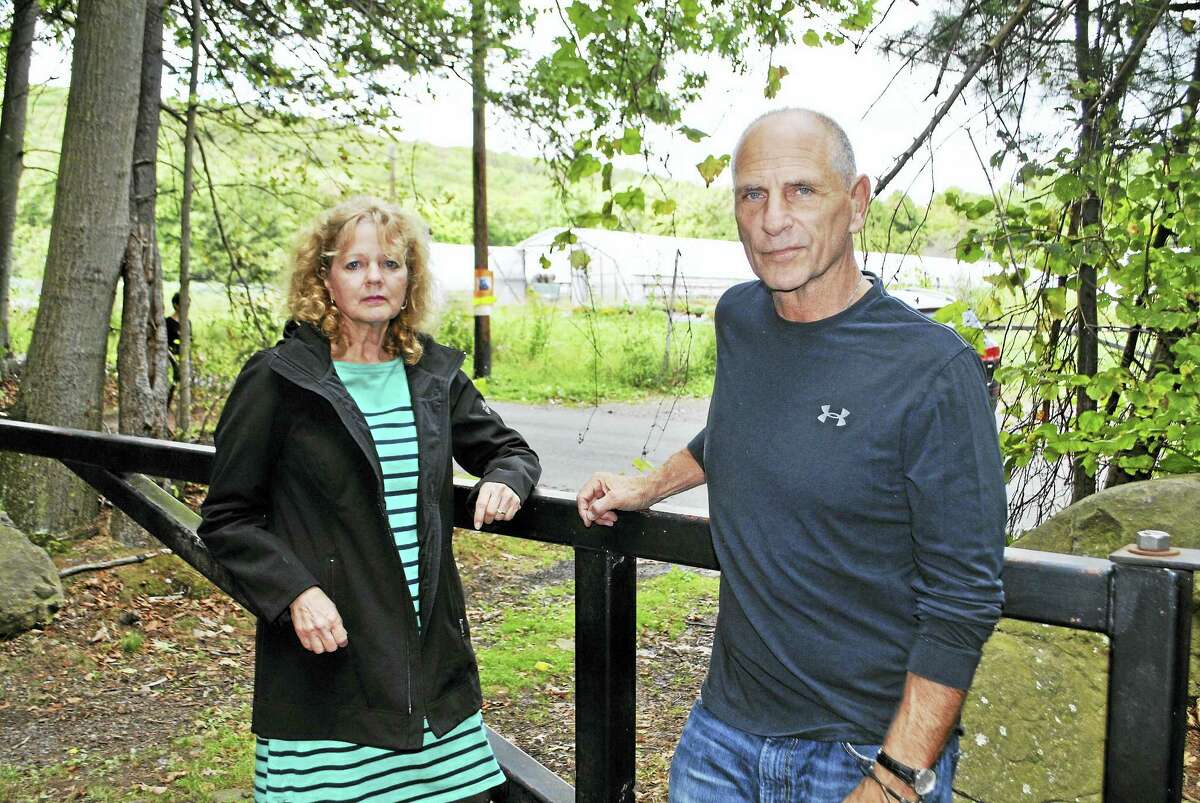 Mary Alice McSherry and Pat Destito standing near the gate of the Red Trail that leads to Wintergreen Lake in Hamden. Missy was soon near the gate shortly after she ran away.