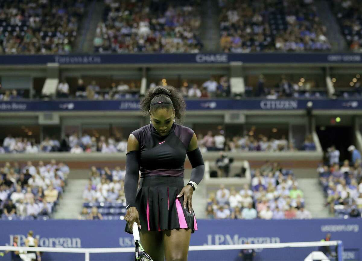 Serena Williams walks back to the service line between serves from Karolina Pliskova on Thursday.