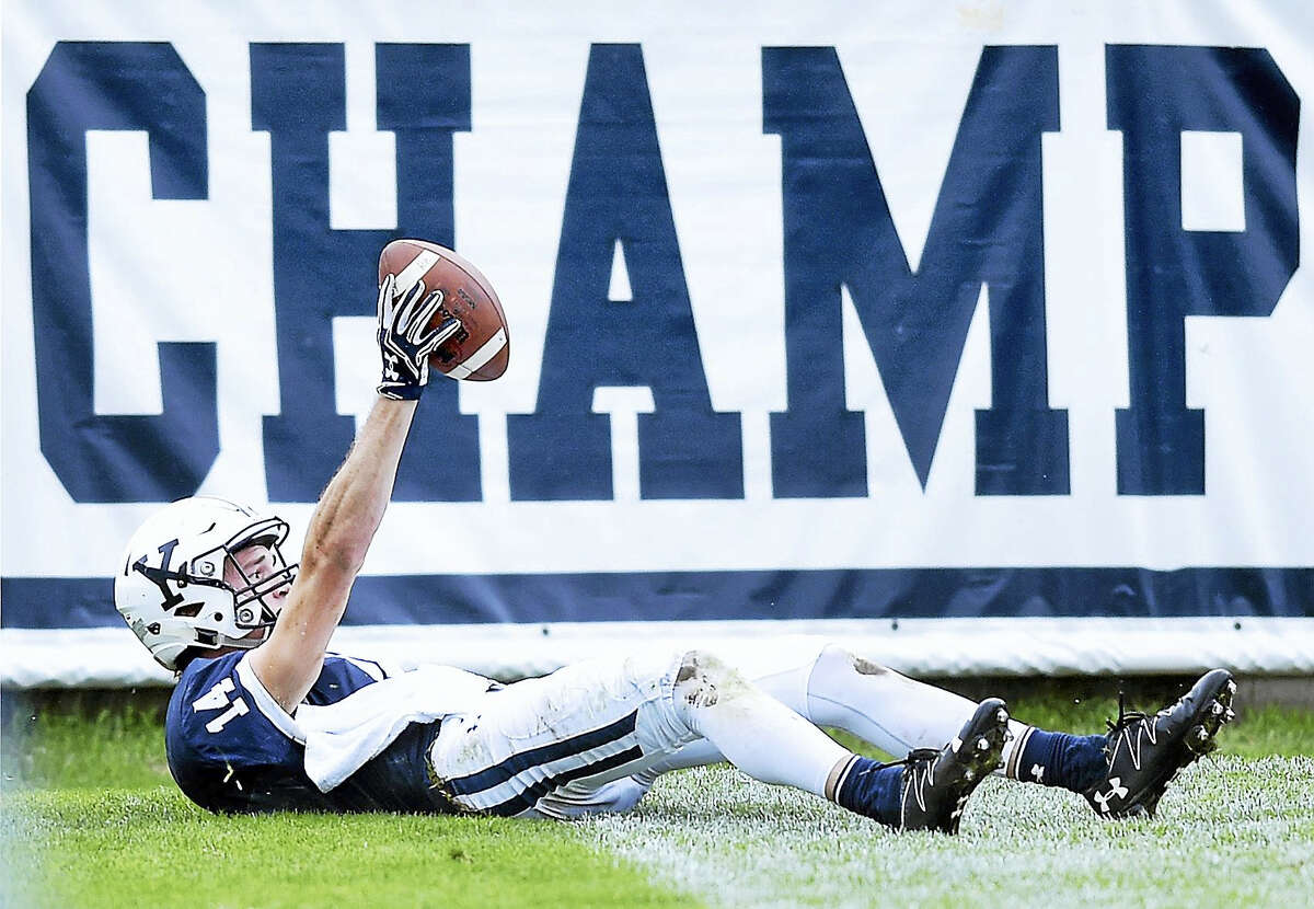 Yale’s Reed Klubnik shows the ball after catching a touchdown pass near the end of the first half.