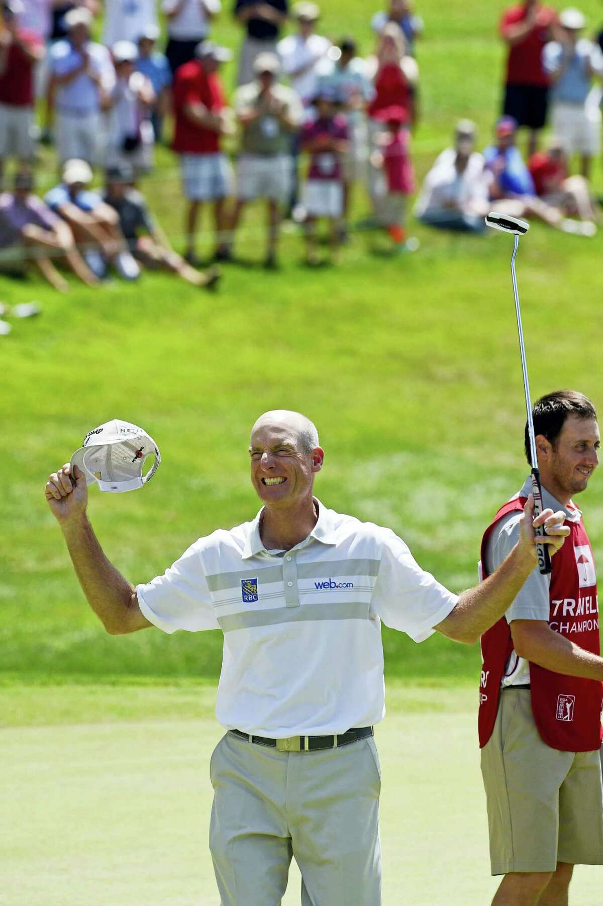 Jim Furyk celebrates after shooting a PGA-record 58 during the final round of the Travelers in Cromwell on Sunday.