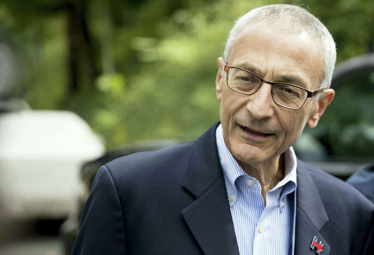 In this Oct. 5, 2016, photo, Hillary Clinton campaign chairman John Podesta speaks to members of the media outside Clinton’s home in Washington. The WikiLeaks organization on Oct. 7, posted what it said were thousands of emails from Podesta, including some with excerpts from speeches she gave to Wall Street executives and others ‘Äî speeches she has declined to release despite demands from Trump.