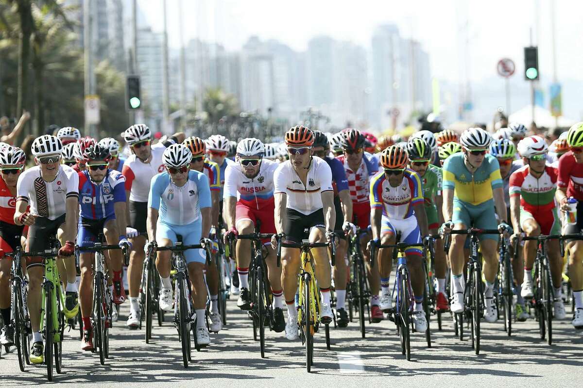 Germany’s Tony Martin, front center, rides in the peloton during the men’s road cycling race along Copacabana beach at the Summer Olympics in Rio de Janeiro on Saturday.