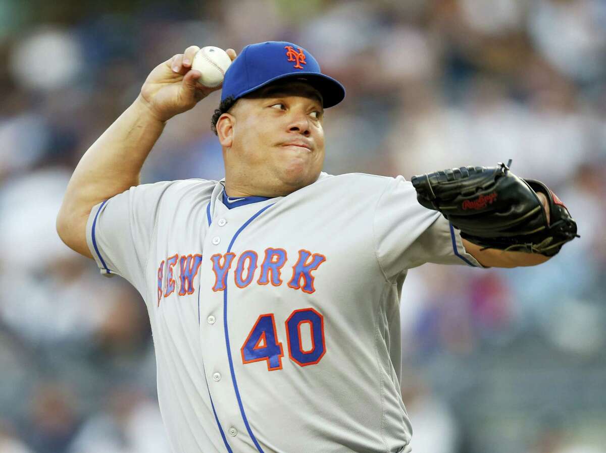 Mets starting pitcher Bartolo Colon delivers during the first inning on Thursday.