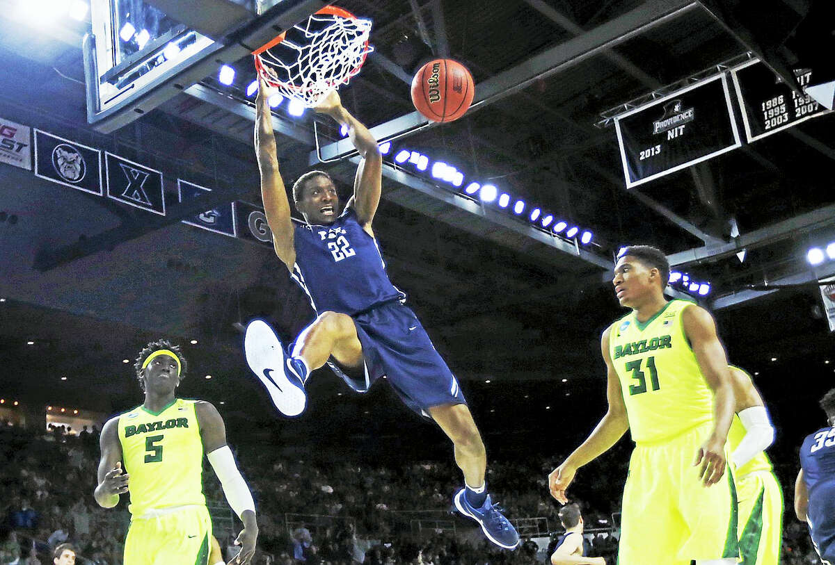 Yale forward Justin Sears dunks against Baylor during a first round NCAA tournament game in Providence, R.I. this past March.