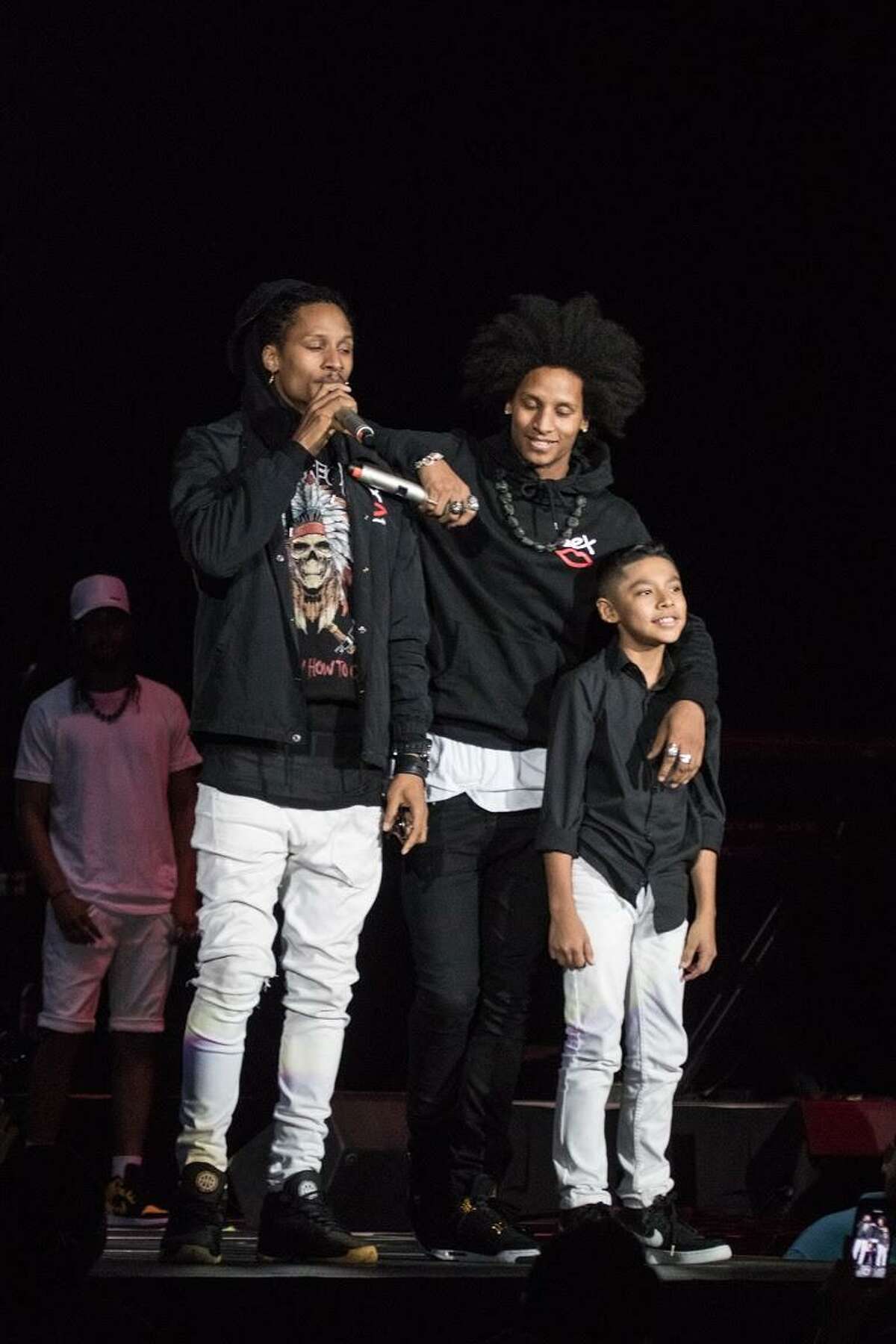 Gilbert Rodriguez shares the stage with his idols Les Twins during Summer Jam 2017 at the LEA on Tuesday.