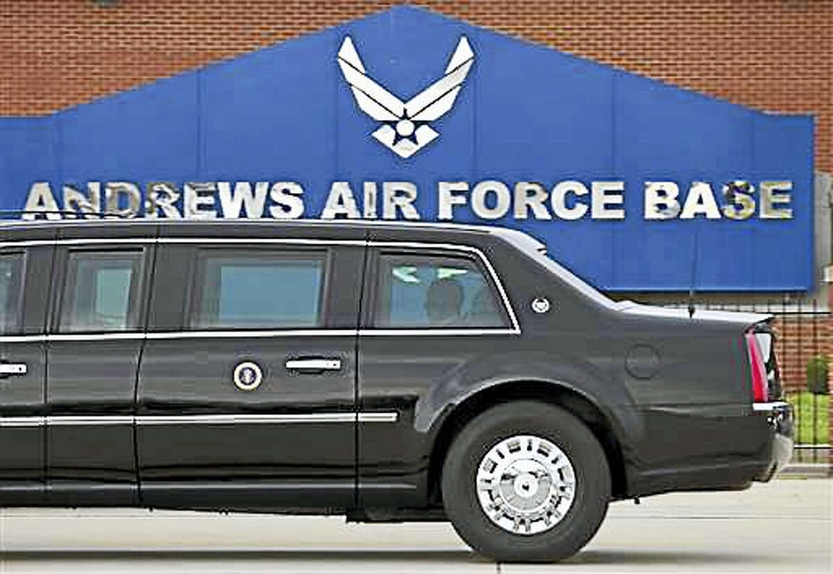 In this photo taken July 15, 2015, President Barack Obama rides in his limousine as he arrives at Joint Base Andrews, Md. Joint Base Andrews tweets that the base is on lockdown due to a report of an active shooter. The tweet sent Thursday, June 30, 2016, turned out to be a false alarm.