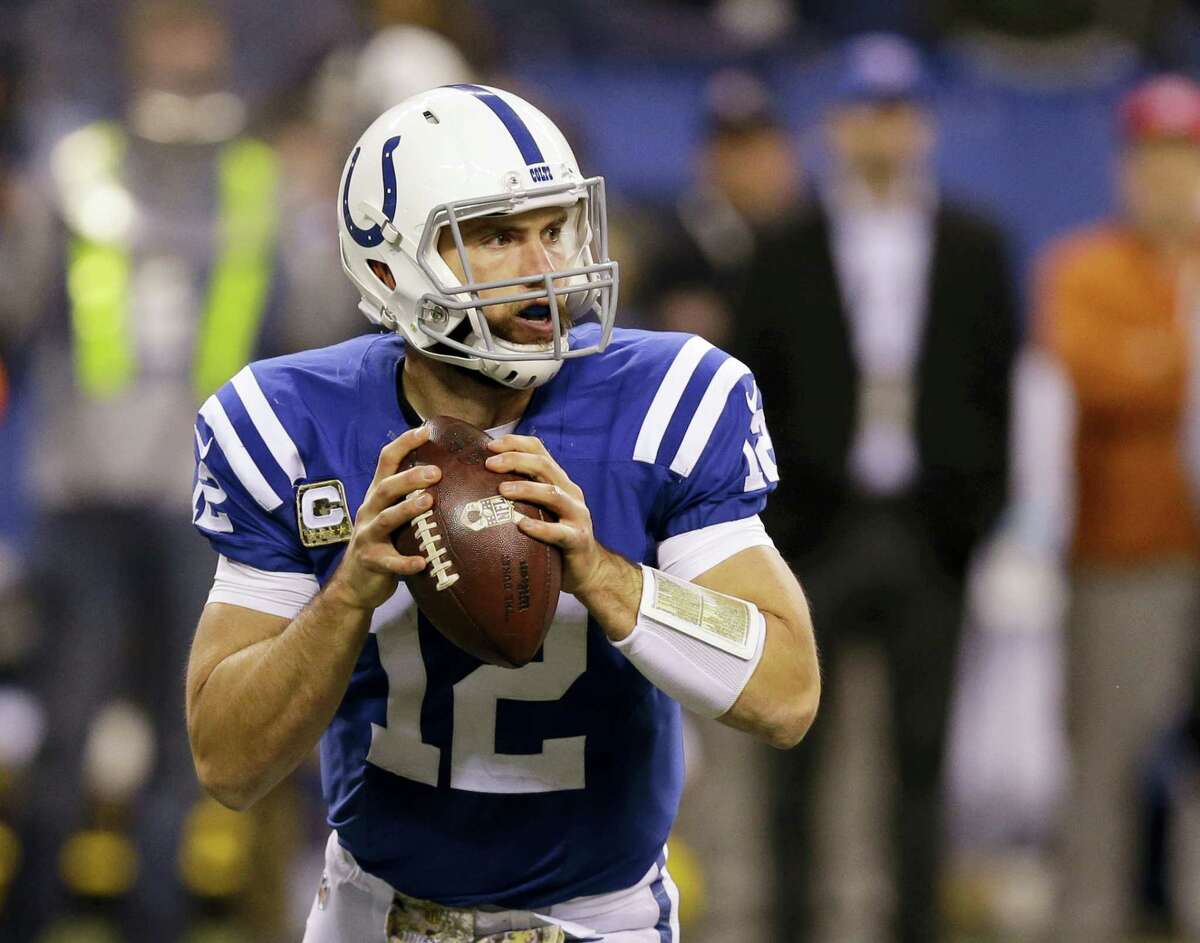 FILE - In this Nov. 8, 2015, file photo, Indianapolis Colts’ Andrew Luck (12) looks to throw during the second half of an NFL football game against the Denver Broncos, in Indianapolis. Luck has signed a new contract with the Indianapolis Colts that covers the next six seasons through 2021. The $140 million deal was completed Wednesday.