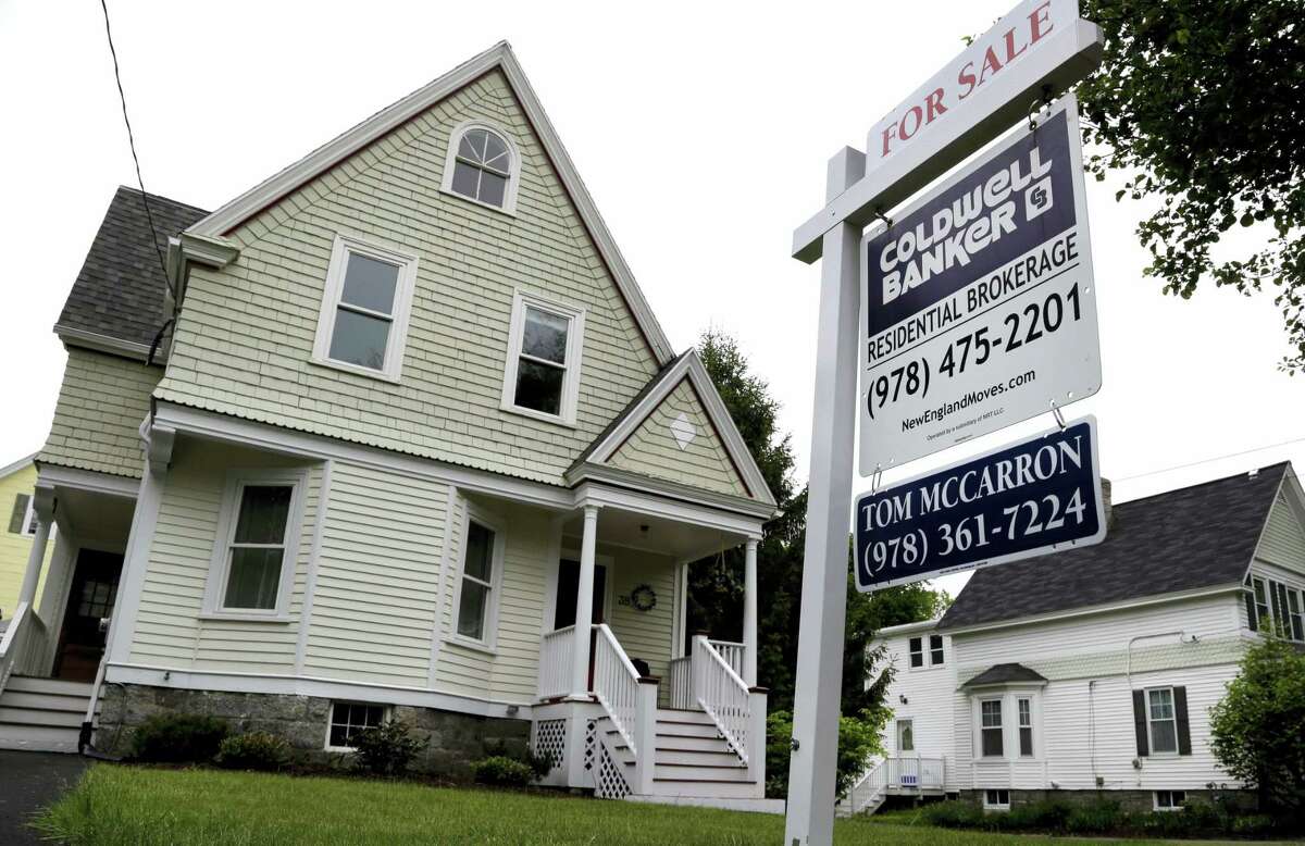 This May 24, 2016 photo shows a home for sale in Andover, Mass. On June 28, 2016, the Standard & Poor’s/Case-Shiller 20-city home price index for April is released.