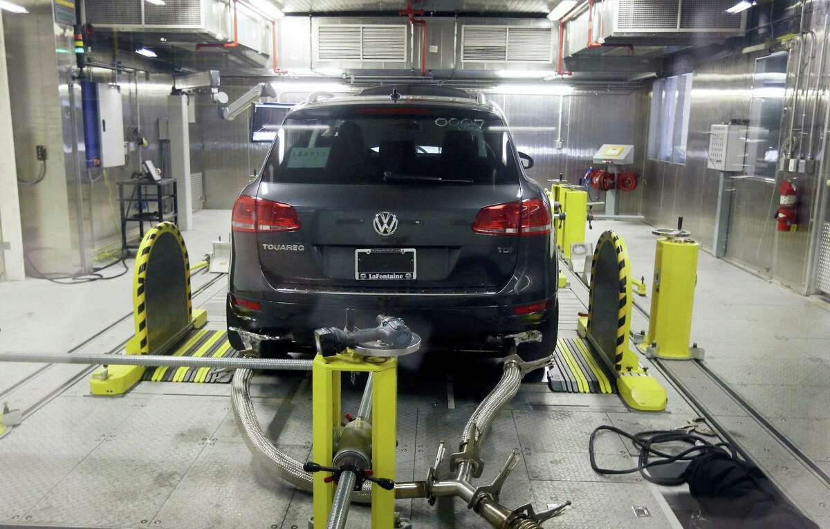 In this Oct. 13, 2015 photo, a Volkswagen Touareg diesel is tested in the Environmental Protection Agency’s cold temperature test facility in Ann Arbor, Mich.