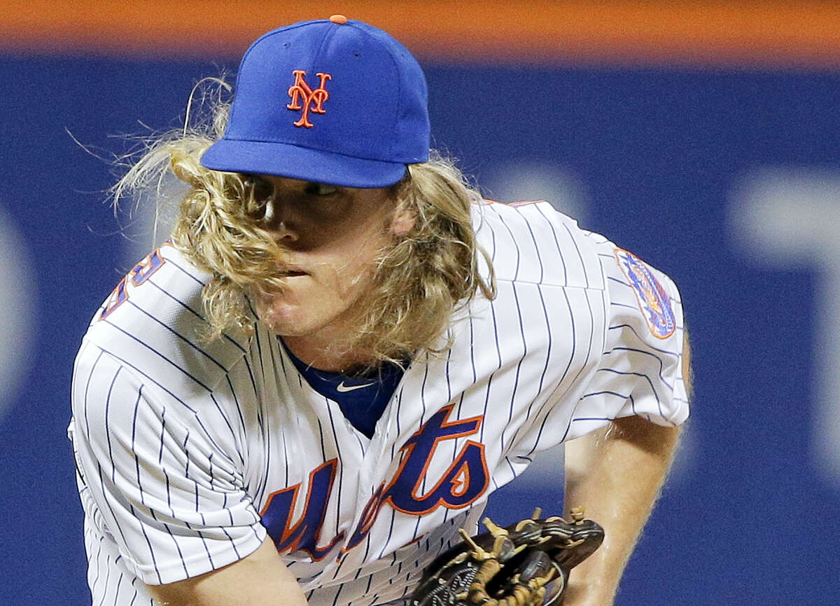 New York Mets pitcher Noah Syndergaard delivers against the Chicago White Sox during the seventh inning of the White Sox’ win Tuesday.