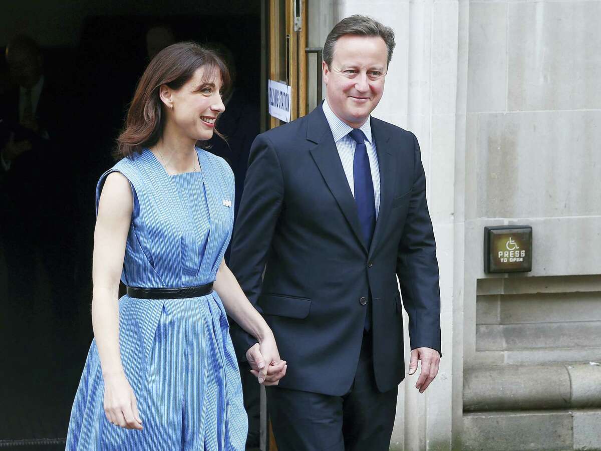 Britain’s Prime Minister David Cameron and his wife, Samantha, smiled as they left after voting in the EU referendum in London Thursday. After the results of the vote, Cameron announced his plan to resign.