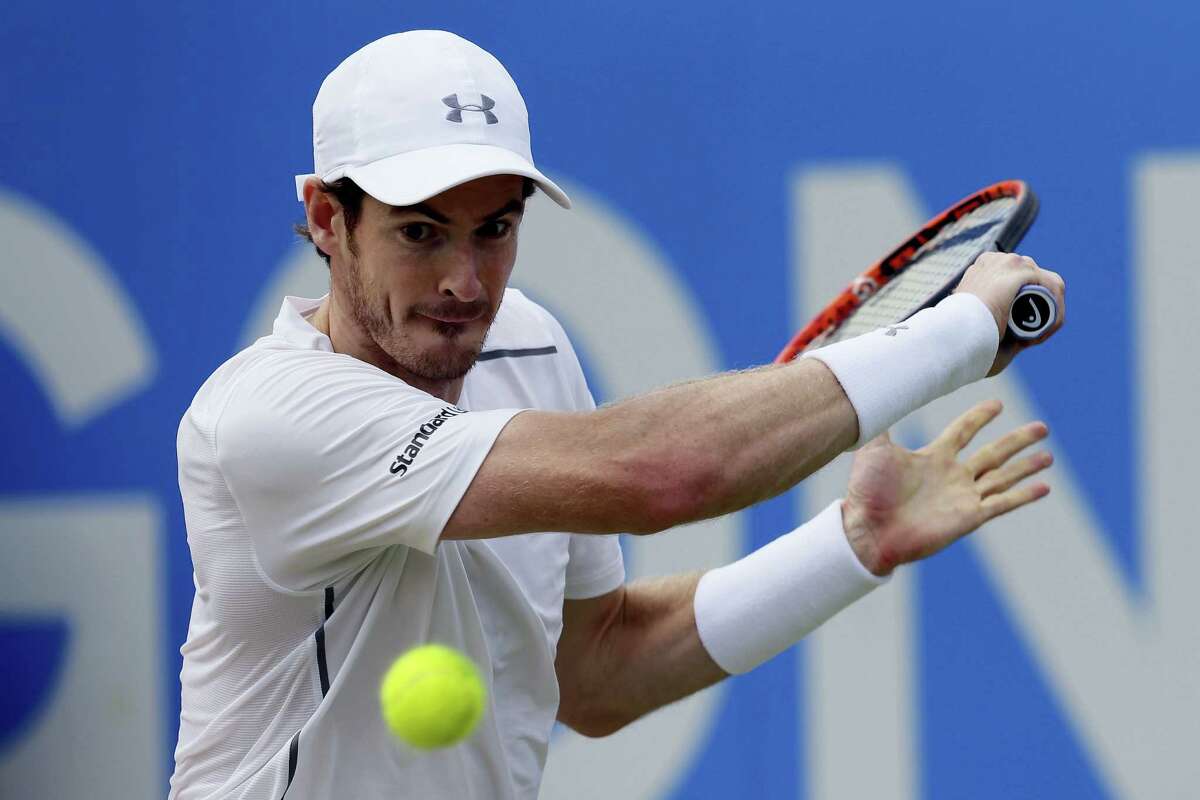 Britain’s Andy Murray plays a return to Canada’s Milos Raonic during their final tennis match at Queen’s Championships London, England on June 19, 2016.