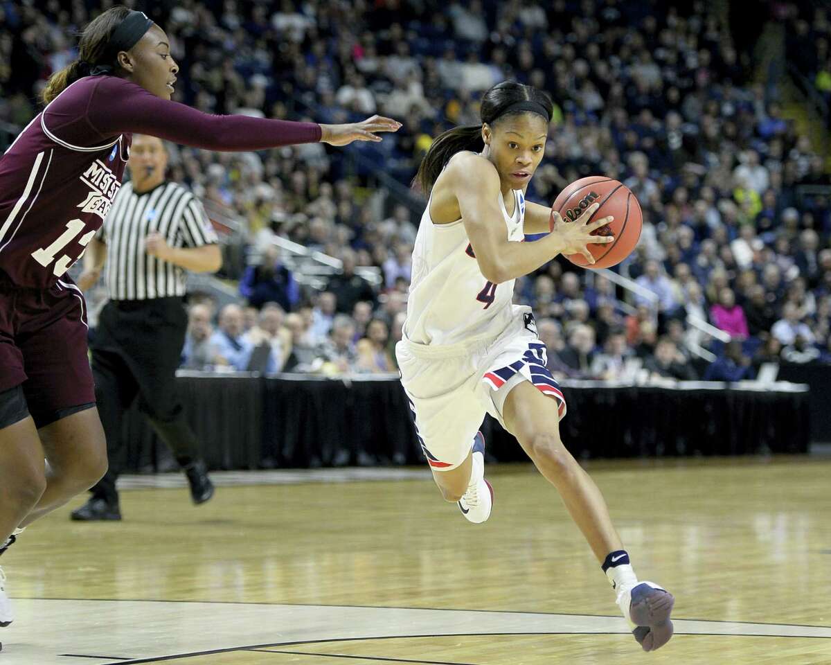 UConn’s Moriah Jefferson, right, drives past Mississippi State’s Ketara Chapel during the regional semifinal Saturday. Jefferson has drawn high praise from some of the top names in the game.