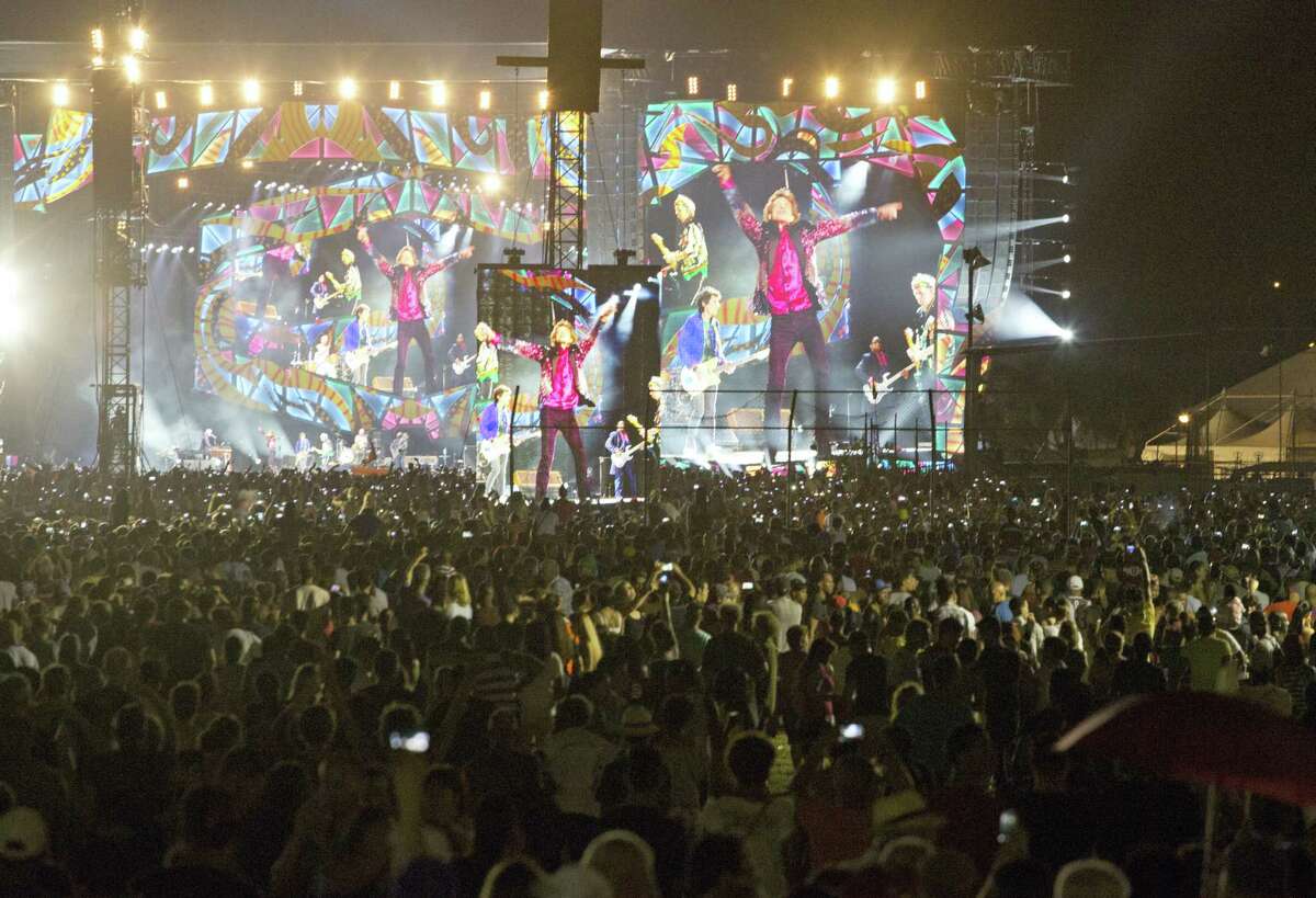 The Rolling Stones are seen on giant screens as they perform for thousands at the Cuidad Deportiva in Havana, Cuba, Friday March 25, 2016. The Stones performed a free concert in Havana, becoming the most famous act to play Cuba since its 1959 revolution.
