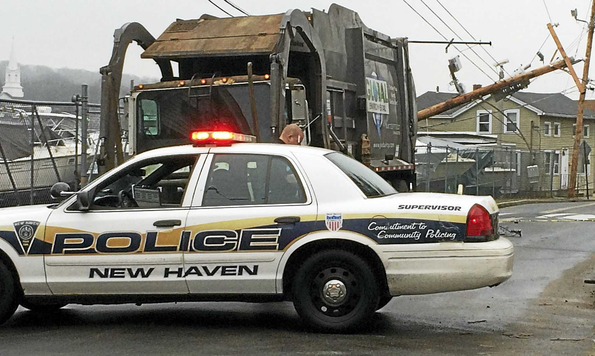 Part of Front Street in New Haven closed after garbage truck takes down ...