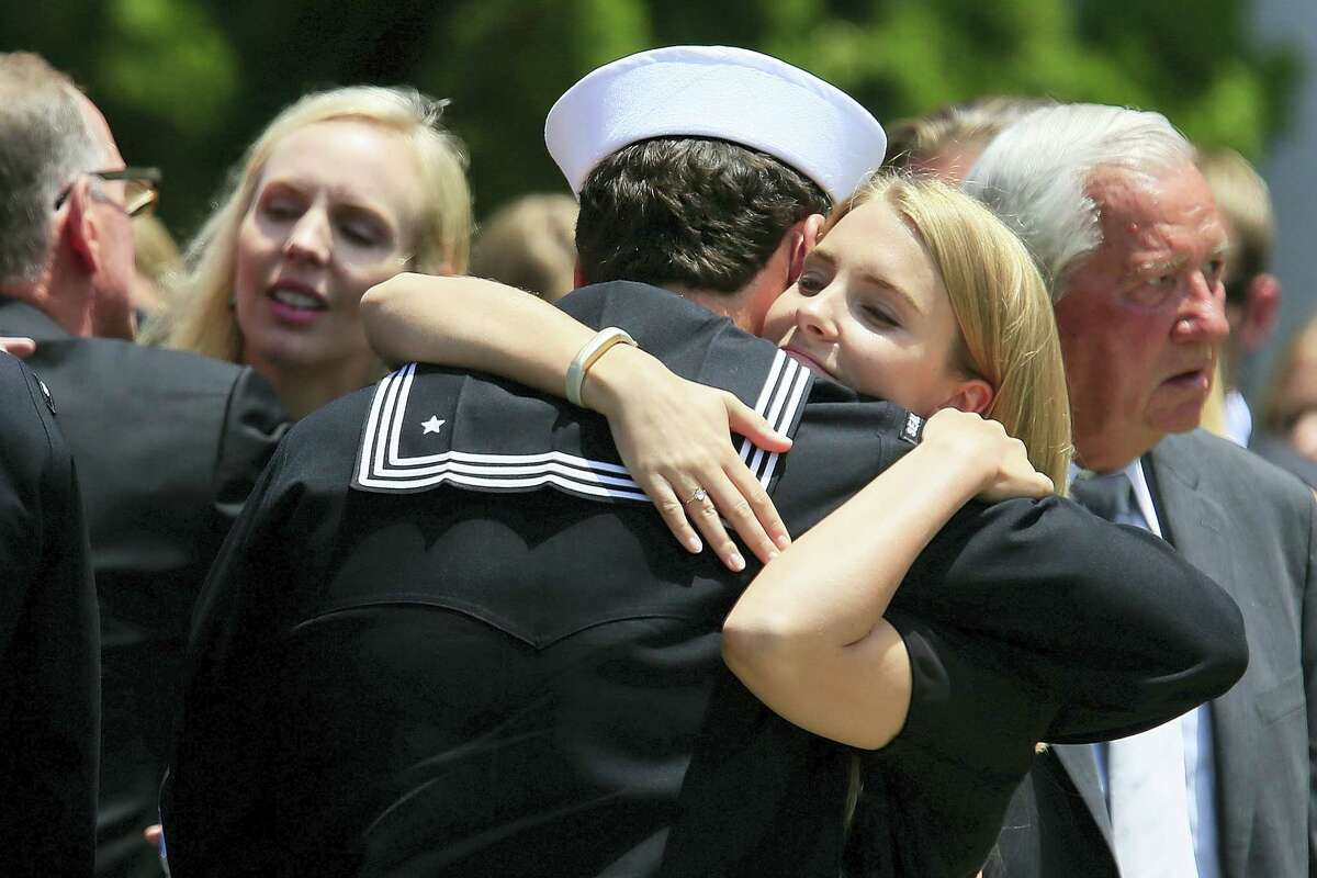 Crowds Line Streets To Honor US Navy SEAL Killed In Iraq