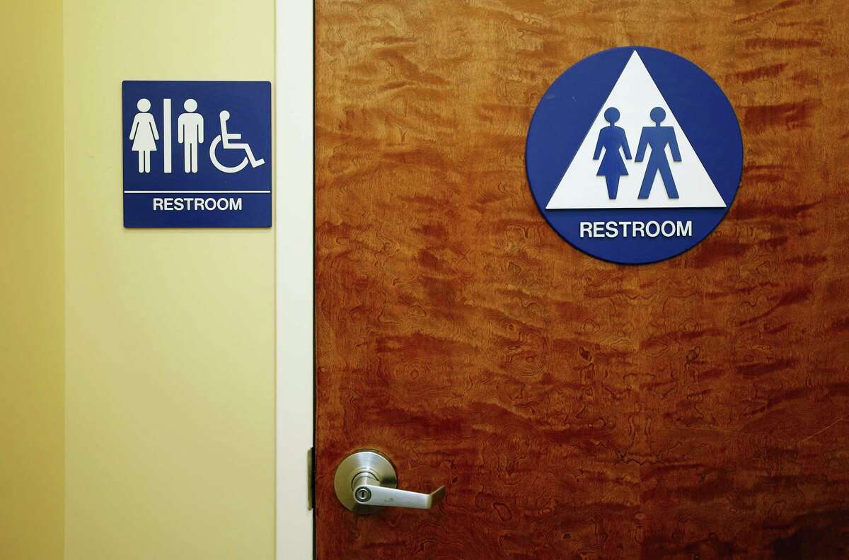 A gender neutral restroom is seen at the Downtown & Vine Restaurant and Wine Bar, Monday, May 9, 2016, in Sacramento, Calif.