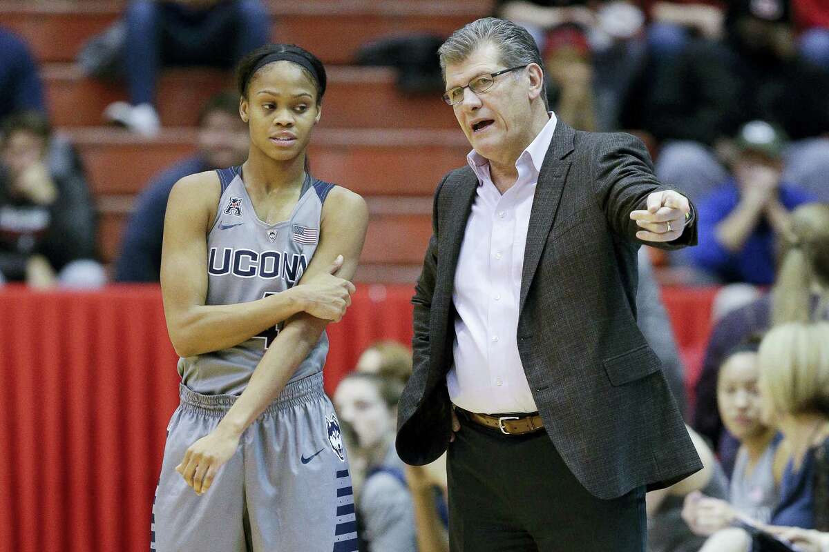 UConn coach Geno Auriemma, right, speaks with Moriah Jefferson during a game earlier this season.