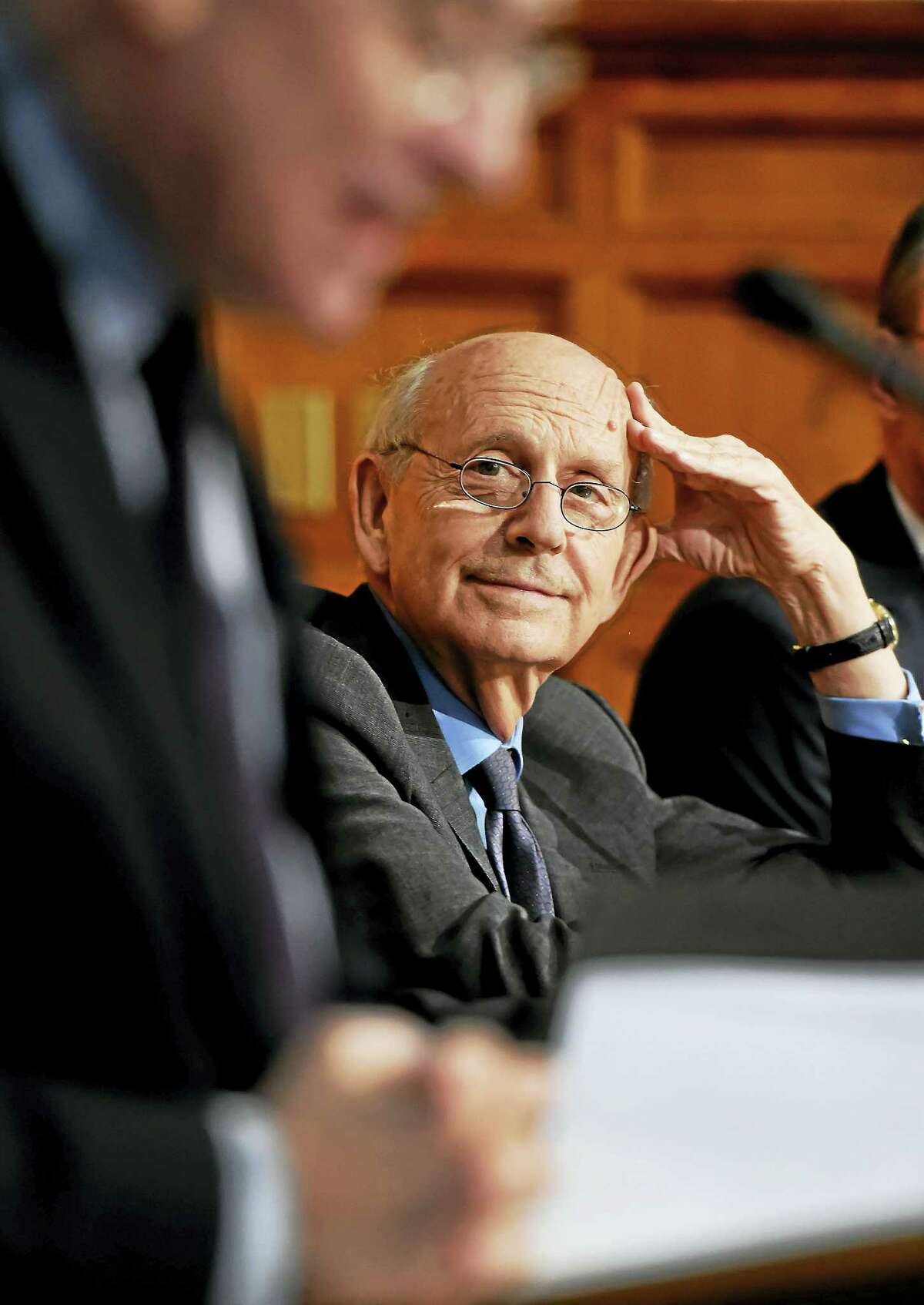 Supreme Court Justice Stephen Breyer, right, listens to Yale Law School Dean Robert Post, before speaking at the Yale Law School in New Haven Wednesday.