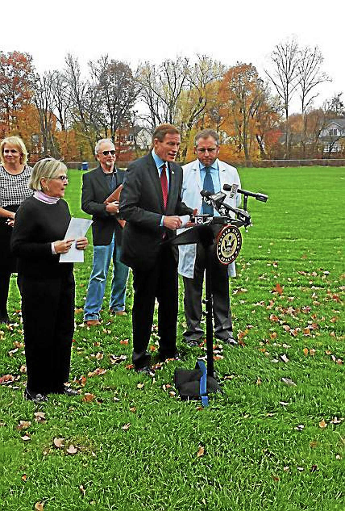 U.S. Sen. Richard Blumenthal, D-Connecticut, was joined by Nancy Alderman, left, of Environment and Health Inc. and Dr. Homero Horari of Mount Sinai Hospital in New York City to discuss the potential dangers of crumb rubber pieces in synthetic turf fields in West Hartford in November.