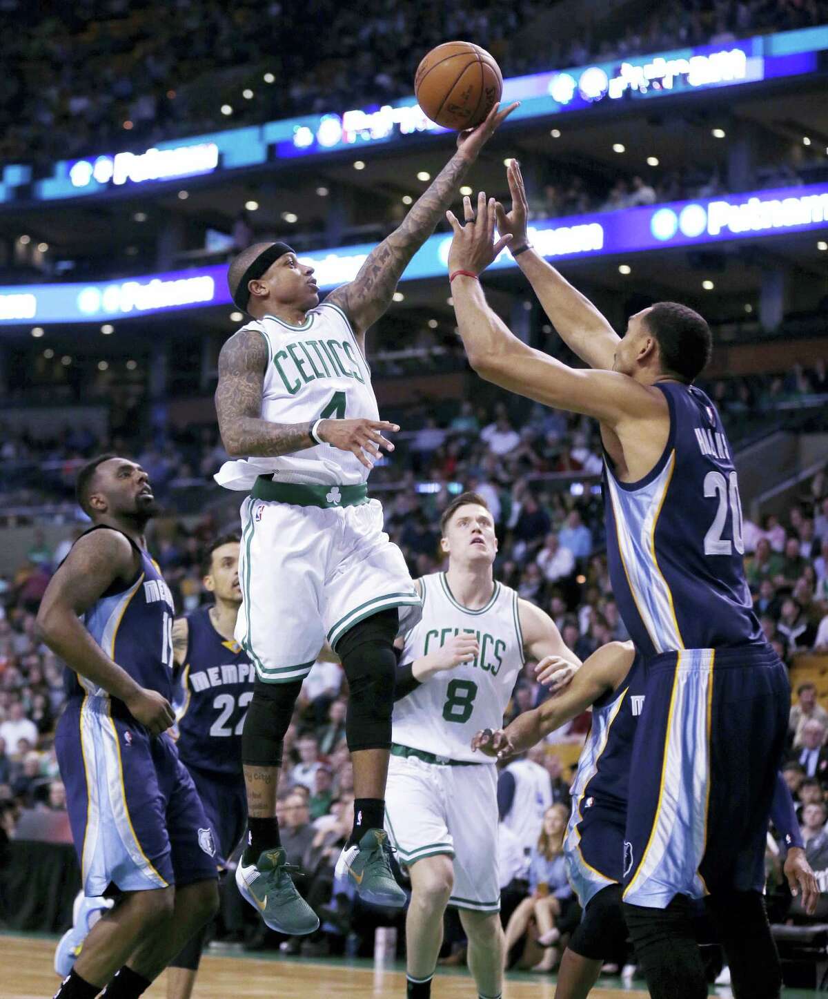 Boston Celtics guard Isaiah Thomas (4) drives to the basket against the Memphis Grizzlies during the first quarter Wednesday in Boston. Thomas scored 22 points in the Celtics 116-96 win.