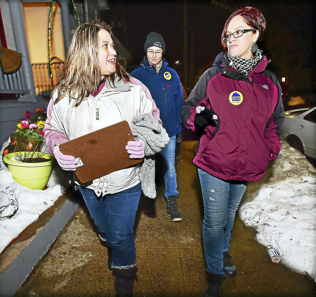 Team leader Veronica Cruz, left, talks to Derby resident Jennifer Olivieri, who grew up in the Fair Haven section of New Haven, as the group looks for homeless individuals during the 2016 Point-in-Time Count Tuesday.