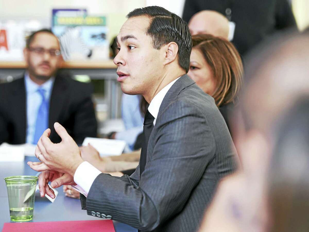 U.S. Department of Housing and Urban Development Secretary Julian Castro has a roundtable discussion with Latino community leaders at the Christopher Columbus Family Academy in New Haven Friday.