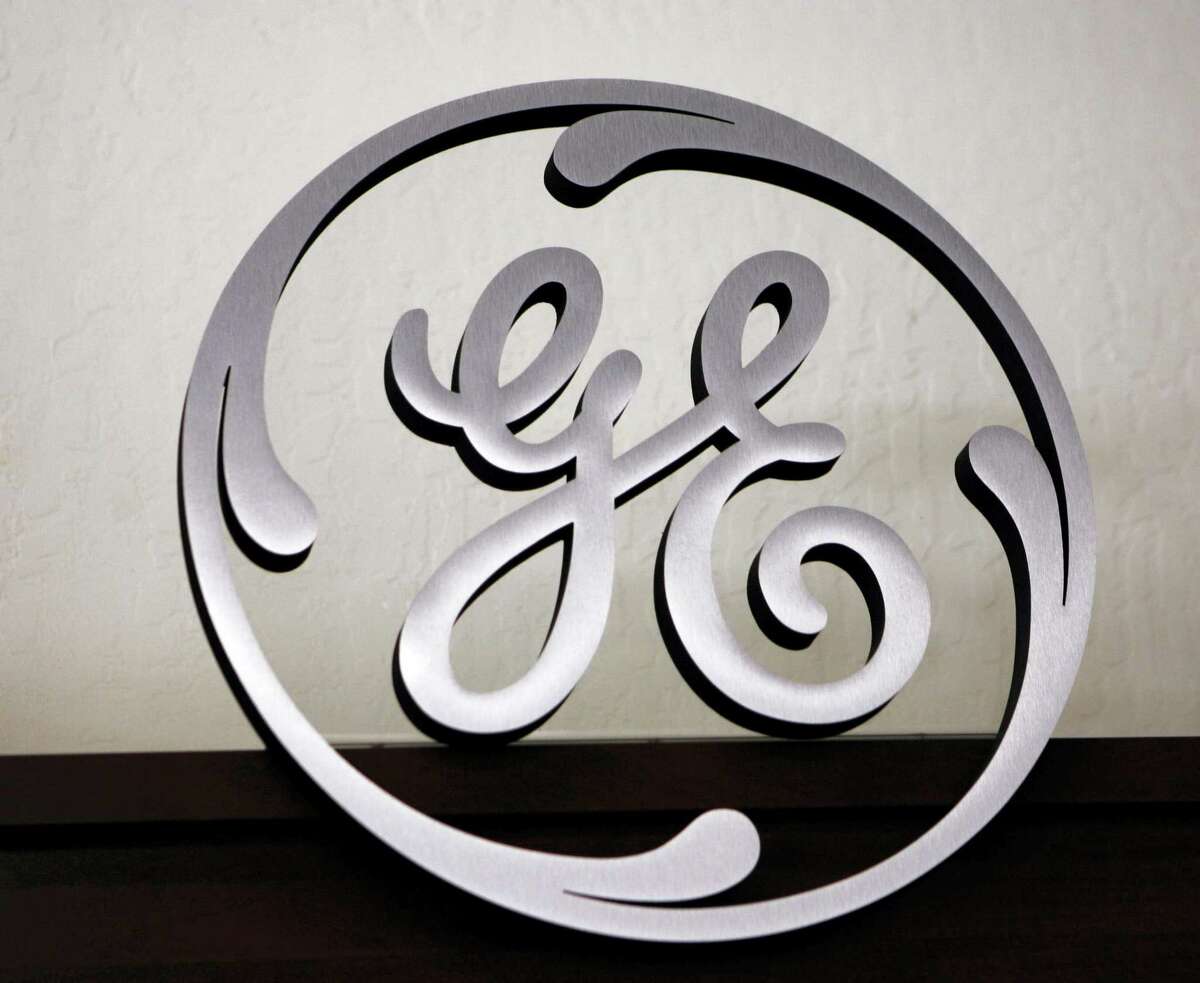 FILE - A General Electric logo on display at Western Appliance store in Mountain View, Calif.
