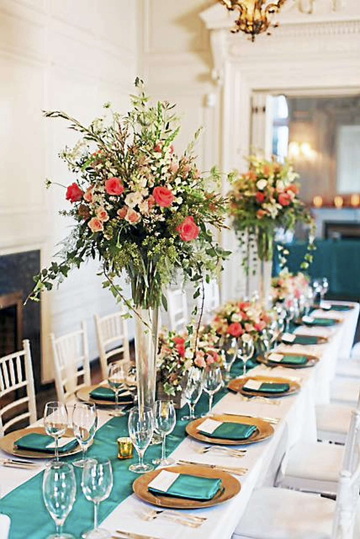 Flowers by Flowers by Danielle, use different types of vessels to create visual interest (photo by Vicki + Erik Photography)