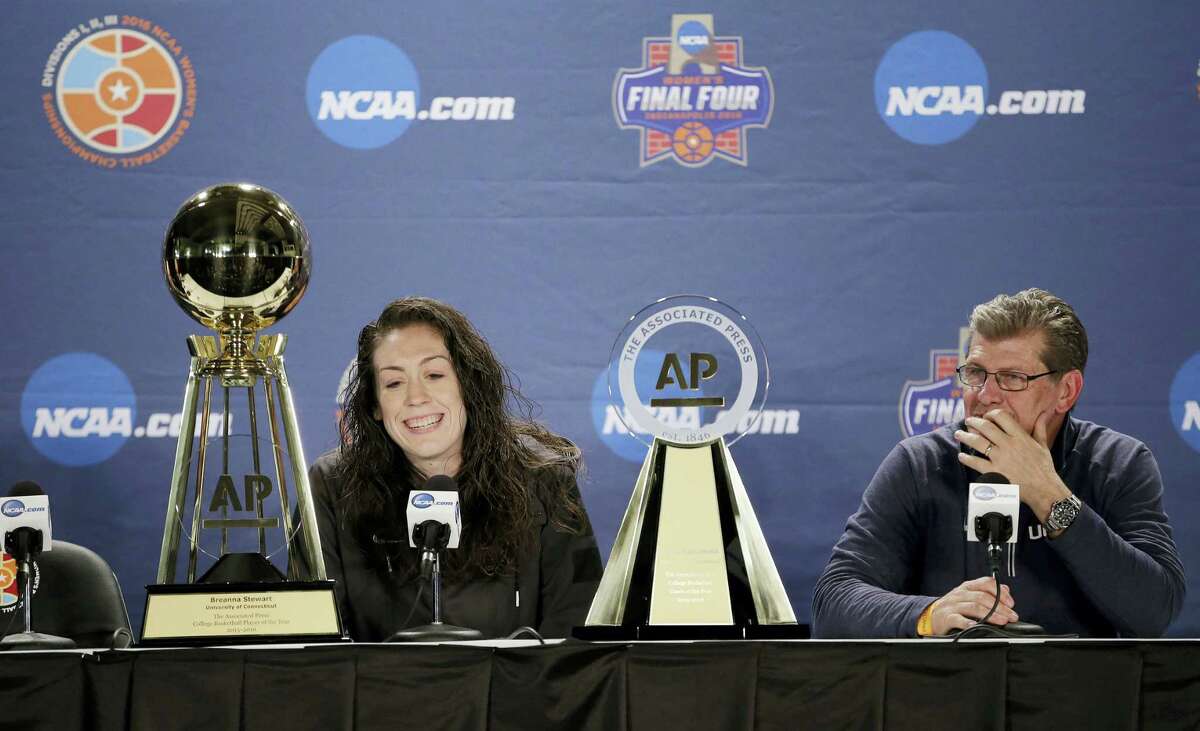 UConn’s Breanna Stewart, left, and coach Geno Auriemma respond to questions during a news conference at the women’s Final Four in Indianapolis on Saturday.