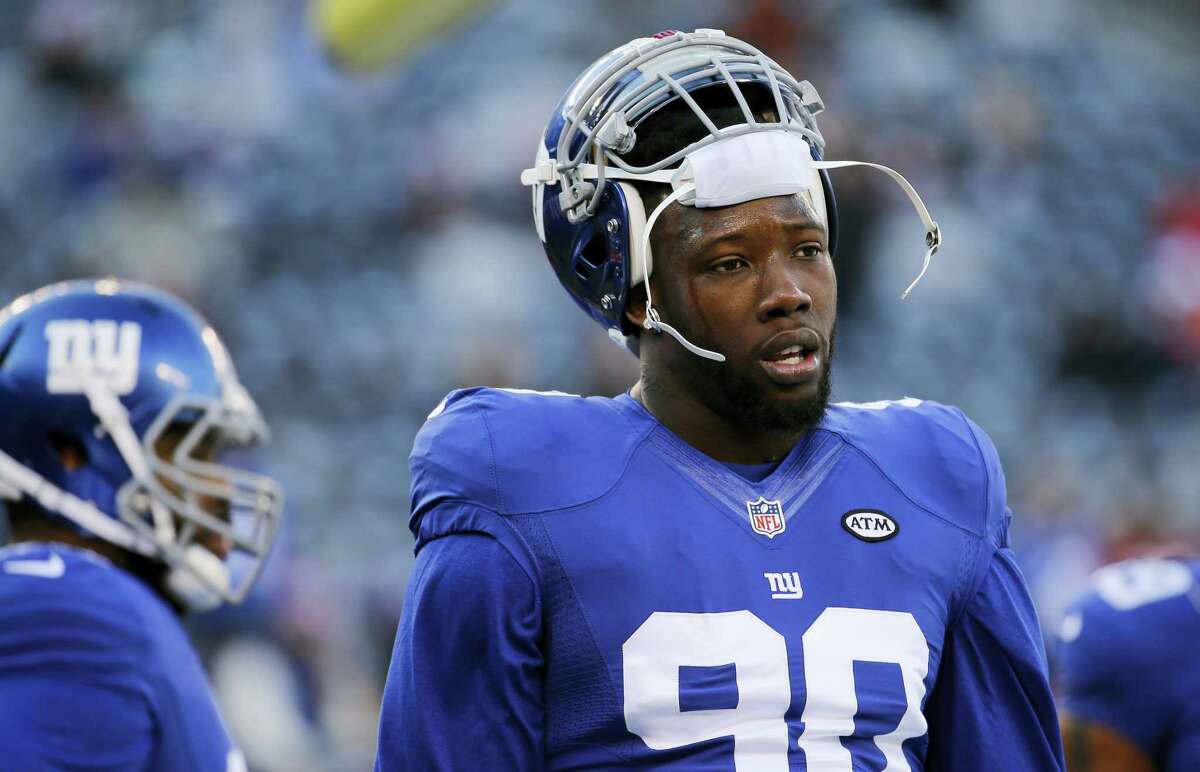New York Giants defensive end Jason Pierre-Paul (90) warms up before playing against the Philadelphia Eagles in an NFL football game, Sunday, Jan. 3, 2016, in East Rutherford, N.J. (AP Photo/Julio Cortez)