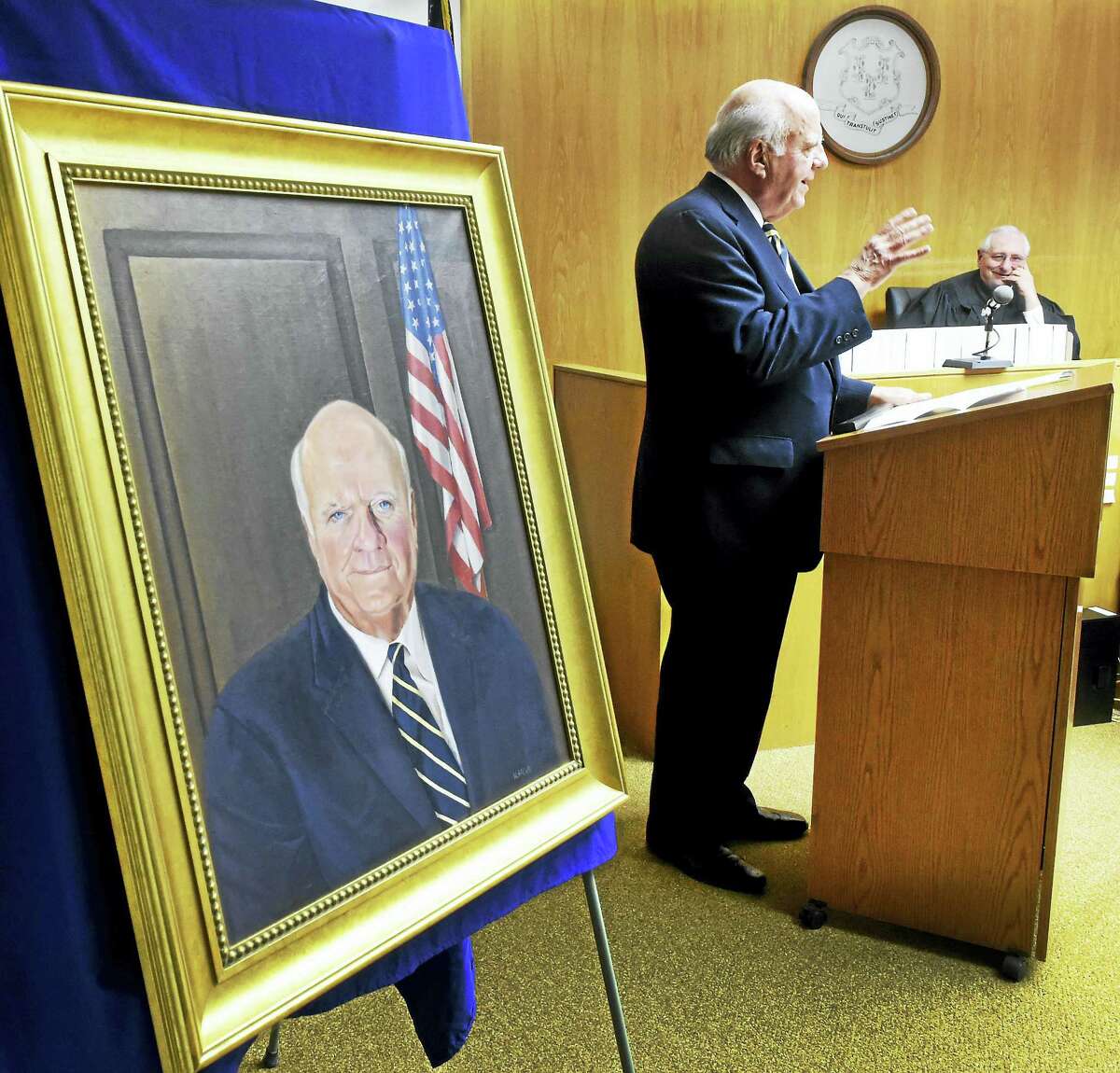 (Peter Hvizdak - New Haven Register) Judge Joseph P. Flynn, retired Chief Judge of the Appellate Court, Judge of the Appellate Court and Superior Court Judge, addresses well-wishers after the unveiling of his portrait at the Derby Superior Court house in Derby Tuesday, January 5, 2016. Administrative Judge Frank A. Iannotti, right, presided over the event. The portrait was commissioned in recognition of Flynn's record of distinguished service as a jurist by the Lower Naugatuck Valley Bar Association.
