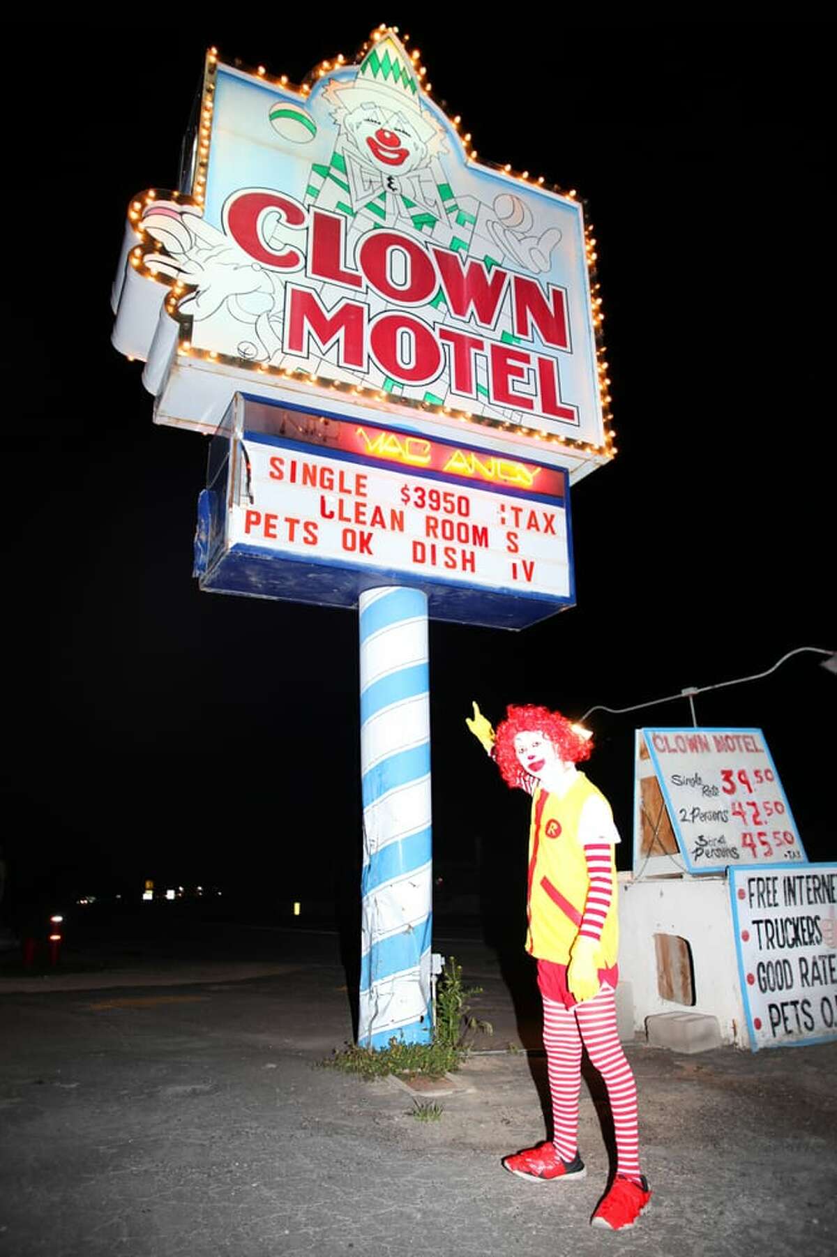 Nightmarish 'Clown Motel' next to town cemetery up for sale