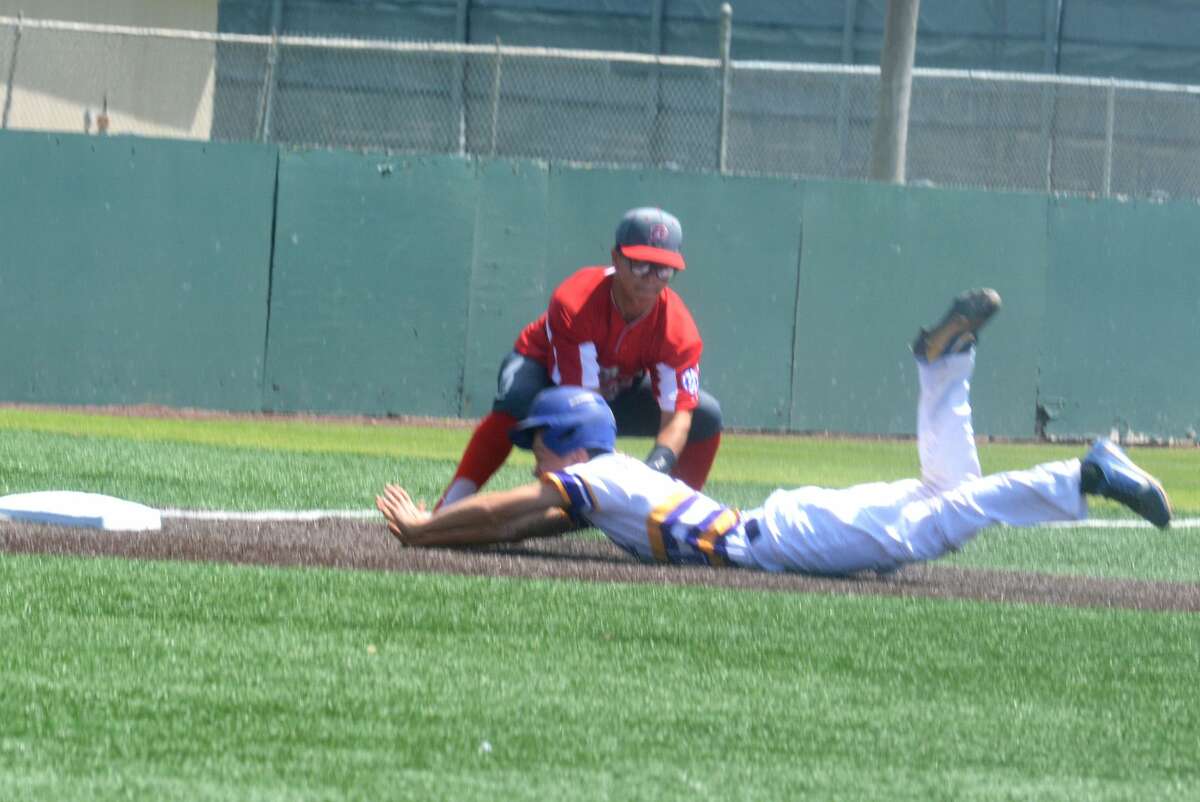 Plainview third baseman Jonathan Garza tags out a diving Adam Augustine of Tallassee, Ala., during the second inning of a Babe Ruth Southwest Regional Tournament game at Wilder Field Saturday.