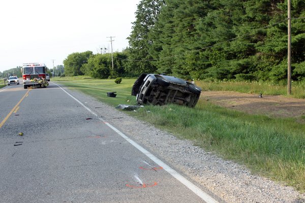 Man ejected from vehicle in rollover crash