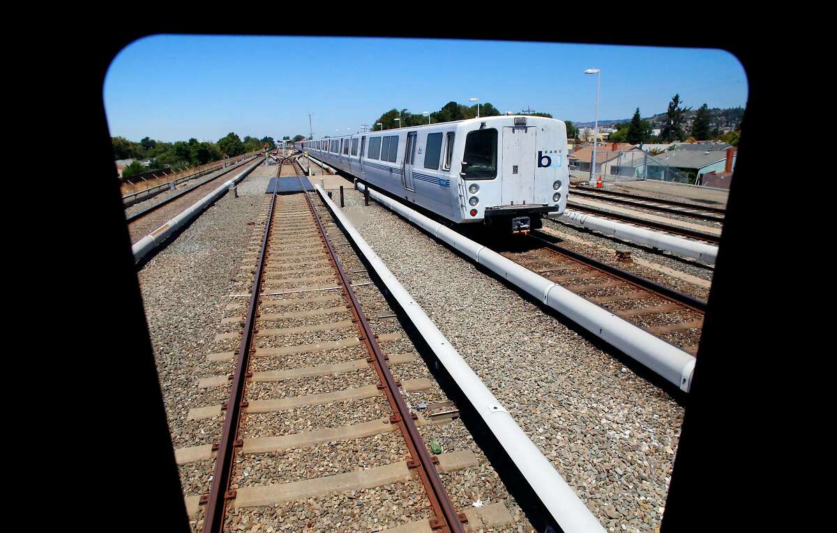 The view from a new train as a current model passes by while BART shows off one of their new train cars for to the media at the South Hayward station, Ca., as seen on Mon. July 23, 2017.