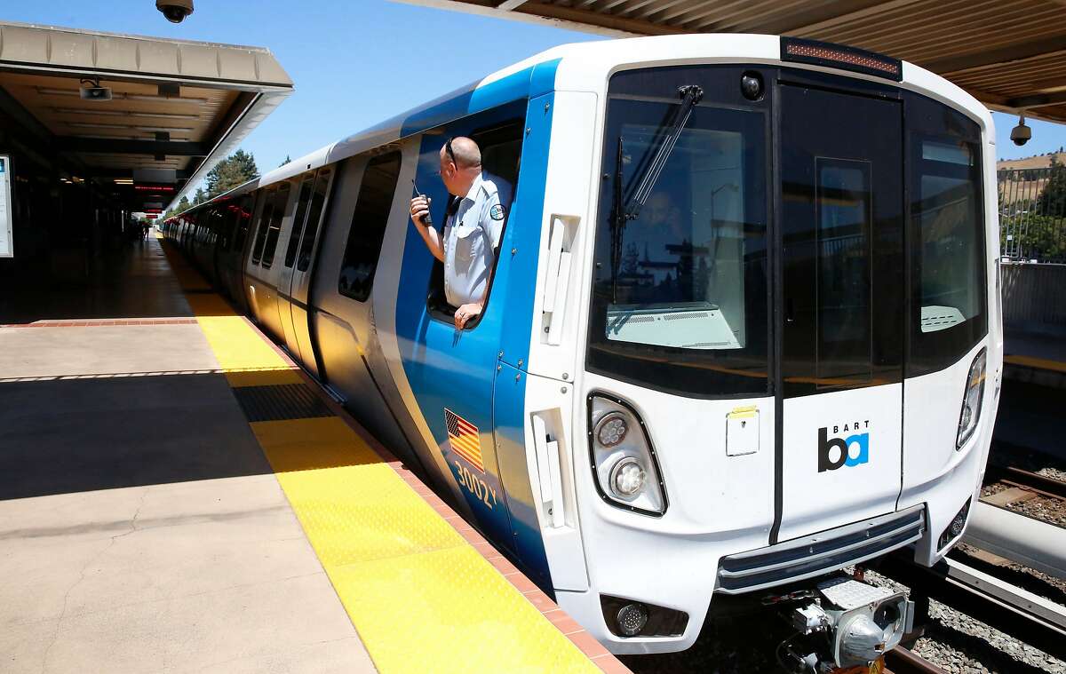 The train operator checks the platform as BART shows off one of their new trains to the media at the South Hayward station, Ca., as seen on Mon. July 23, 2017.